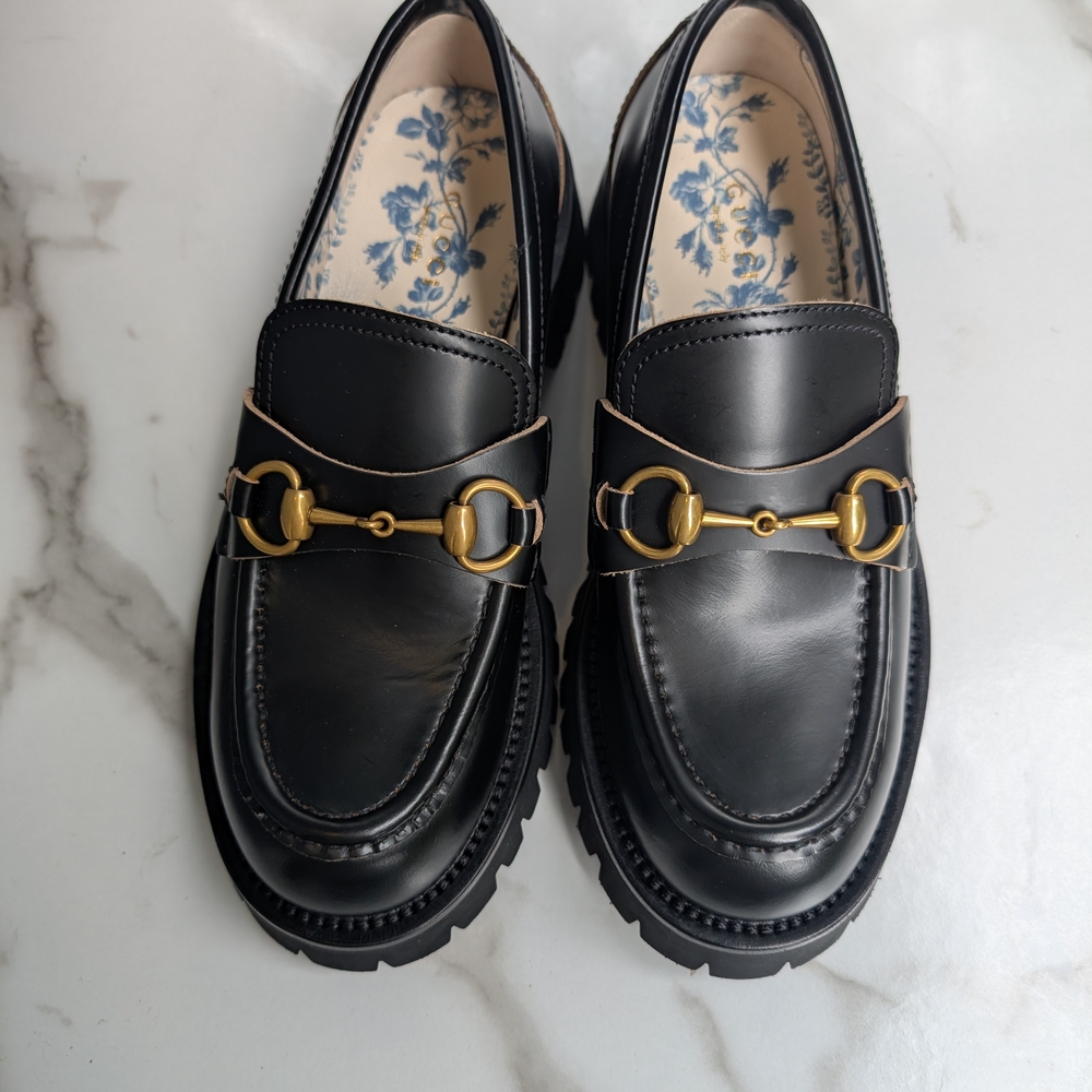 Black Leather Loafers with Gold Detailing